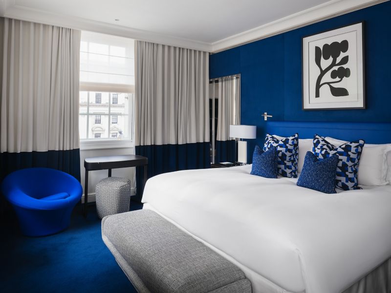 A sophisticated view of the Prestige Suite at Sofitel London St James featuring the signature MyBed and contemporary French-inspired décor.