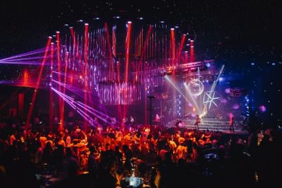 Performers on stage at the extravagant, colourful Face Club in Bucharest, Romania