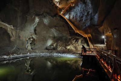 Steep stairs leading down a vast chamber in the Wieliczka Salt Mine, Krakow