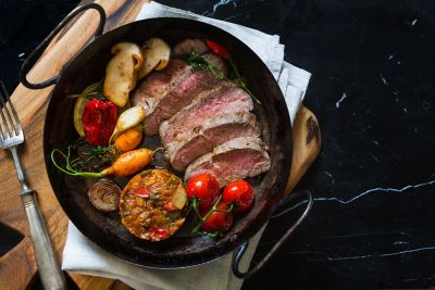 A modern Slovenian dish of sliced roast beef and grilled vegetables