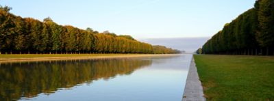 The Grand Canal in the parkland surrounding Versailles Palace near Paris