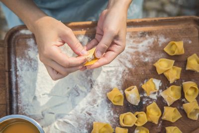 A chef making tortellini, a favourite in Italian restaurants in Paris