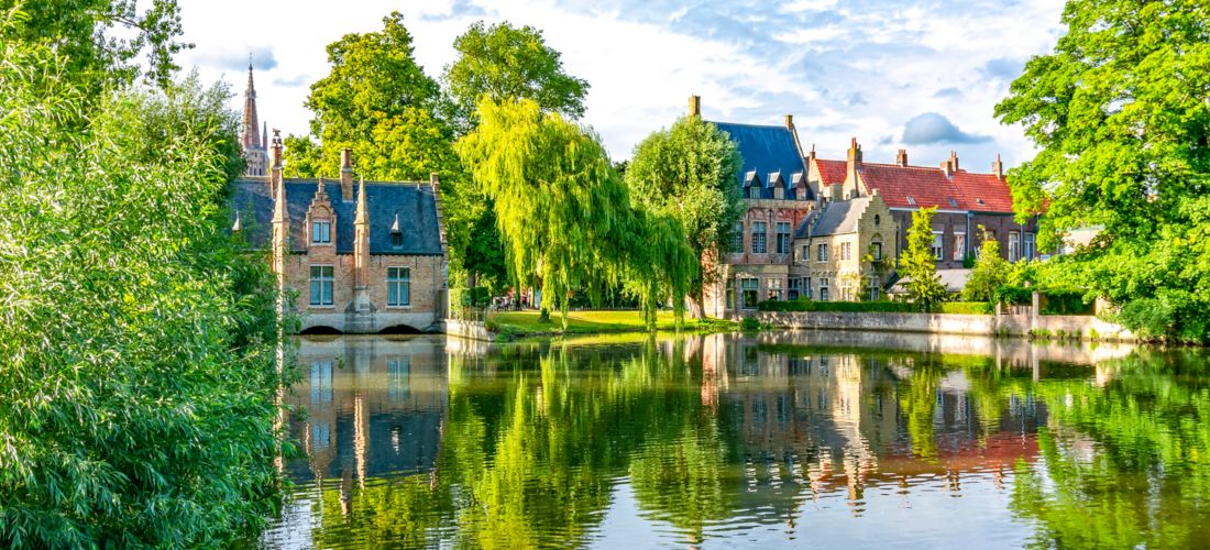 Tranquil Reflections on the Lake of Love in Bruges