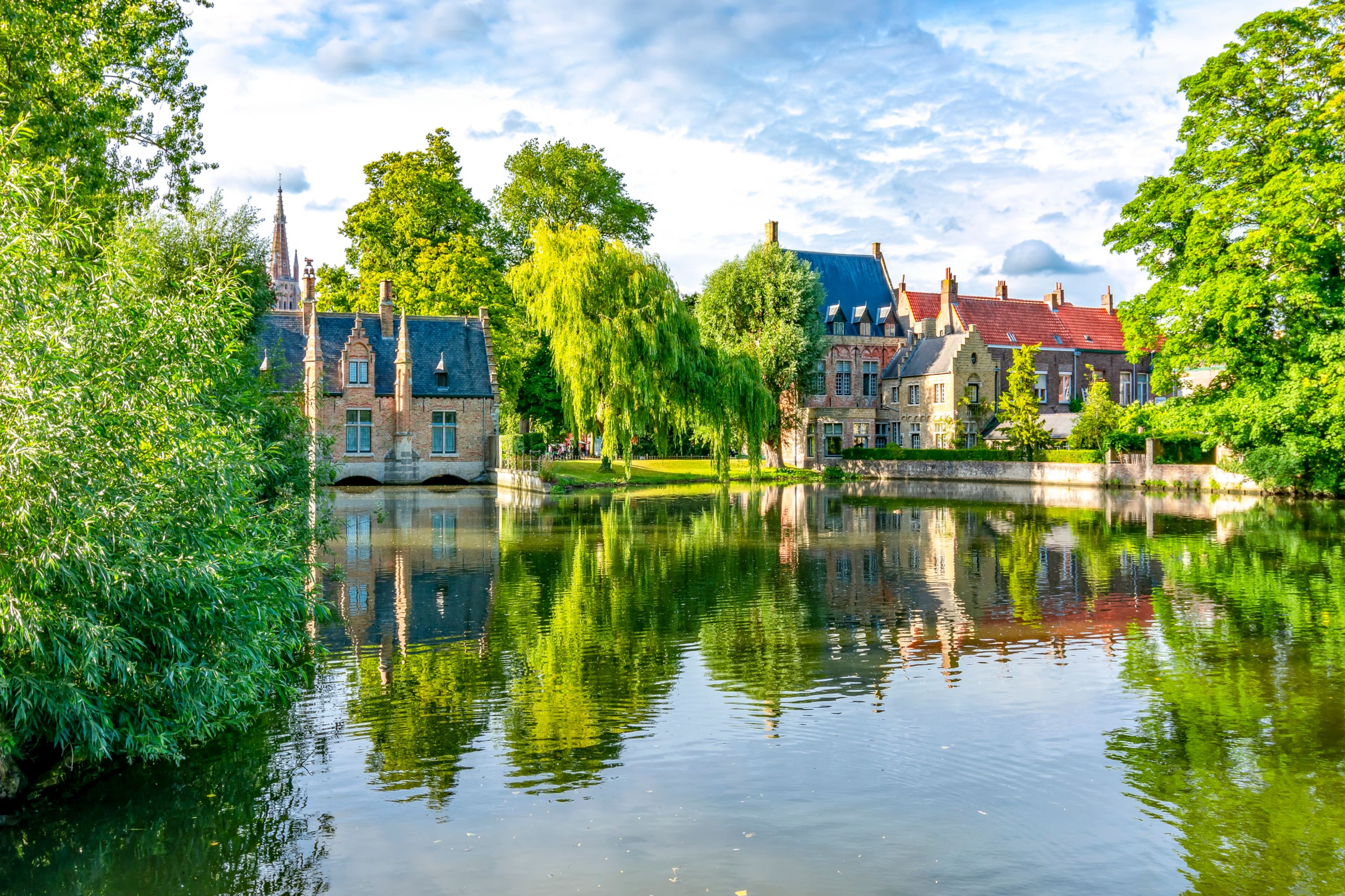 Tranquil Reflections on the Lake of Love in Bruges