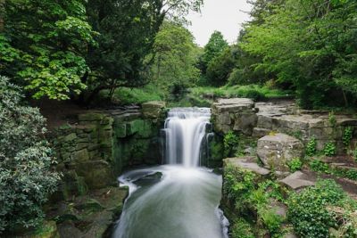 A waterfall in peaceful Jesmond Dene park, Newcastle upon Tyne