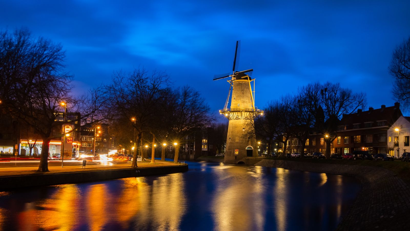 Illuminated Windmill in Schiedam, South Holland at Twilight