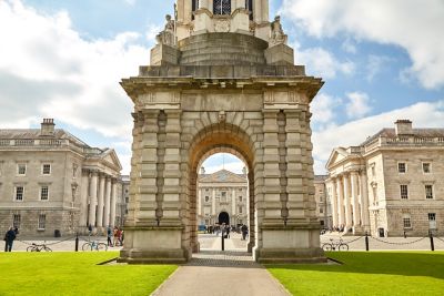 The grand stone archway of the Campanile at Trinity College Dublin
