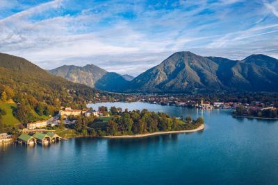 Tranquil Tegernsee with tiny villages on its shores, backed by the Bavarian Alps