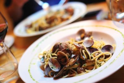 Spaghetti with clams served at an Italian restaurant in Paris