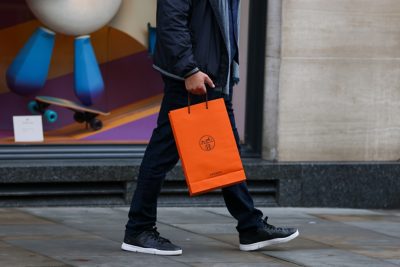 Man with Hermès Shopping Bag