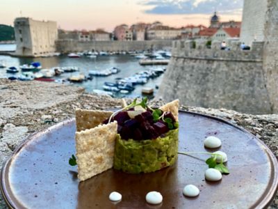 An elegantly plated meal in Dubrovnik's Old Town by the port