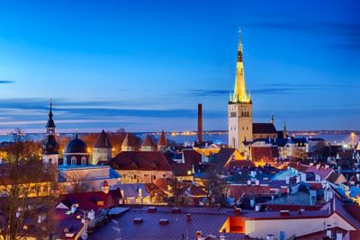 The quaint spires, turrets and rooftops of Tallinn Old Town by night