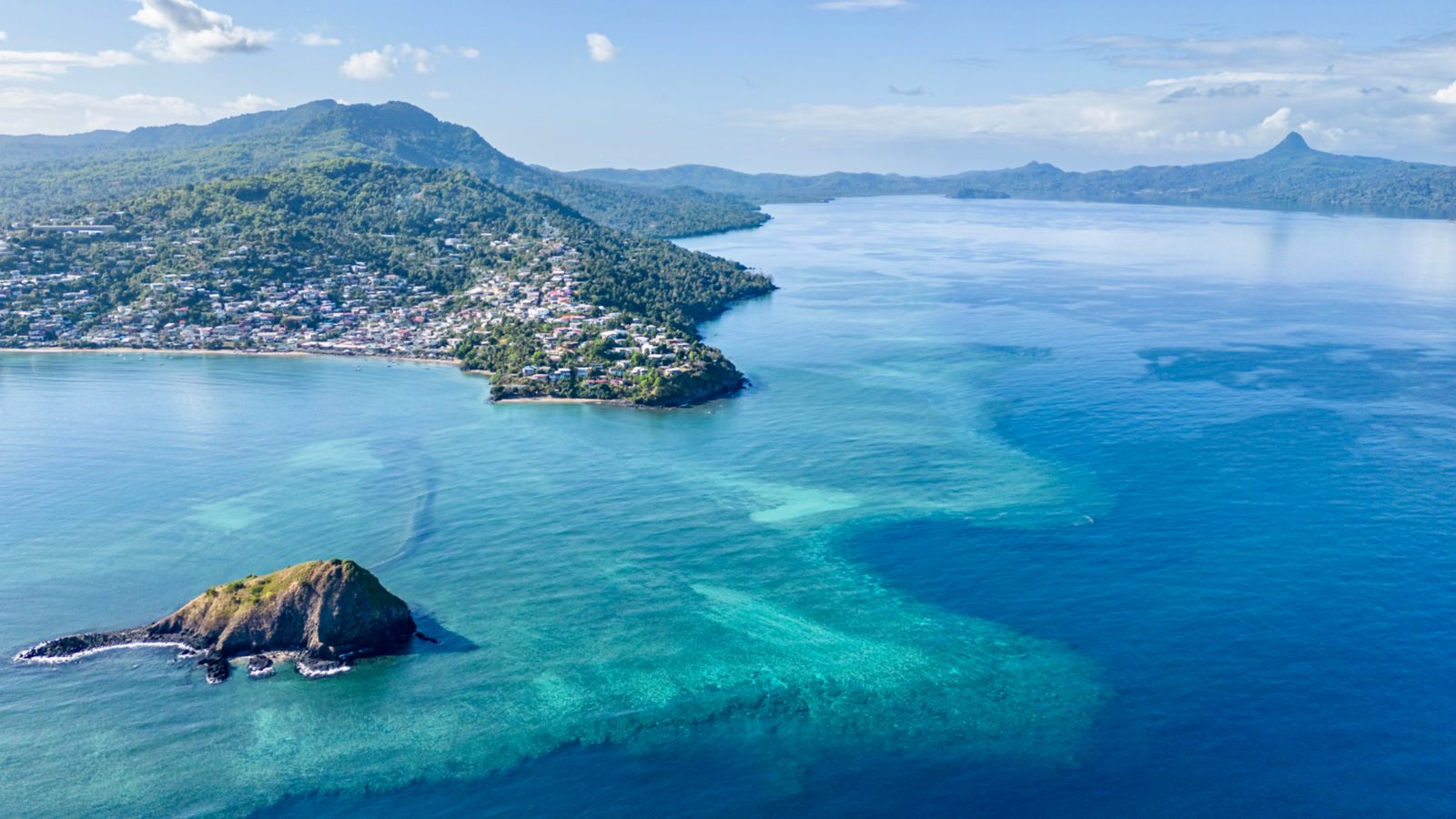 Aerial view of Mayotte's coastline and turquoise waters