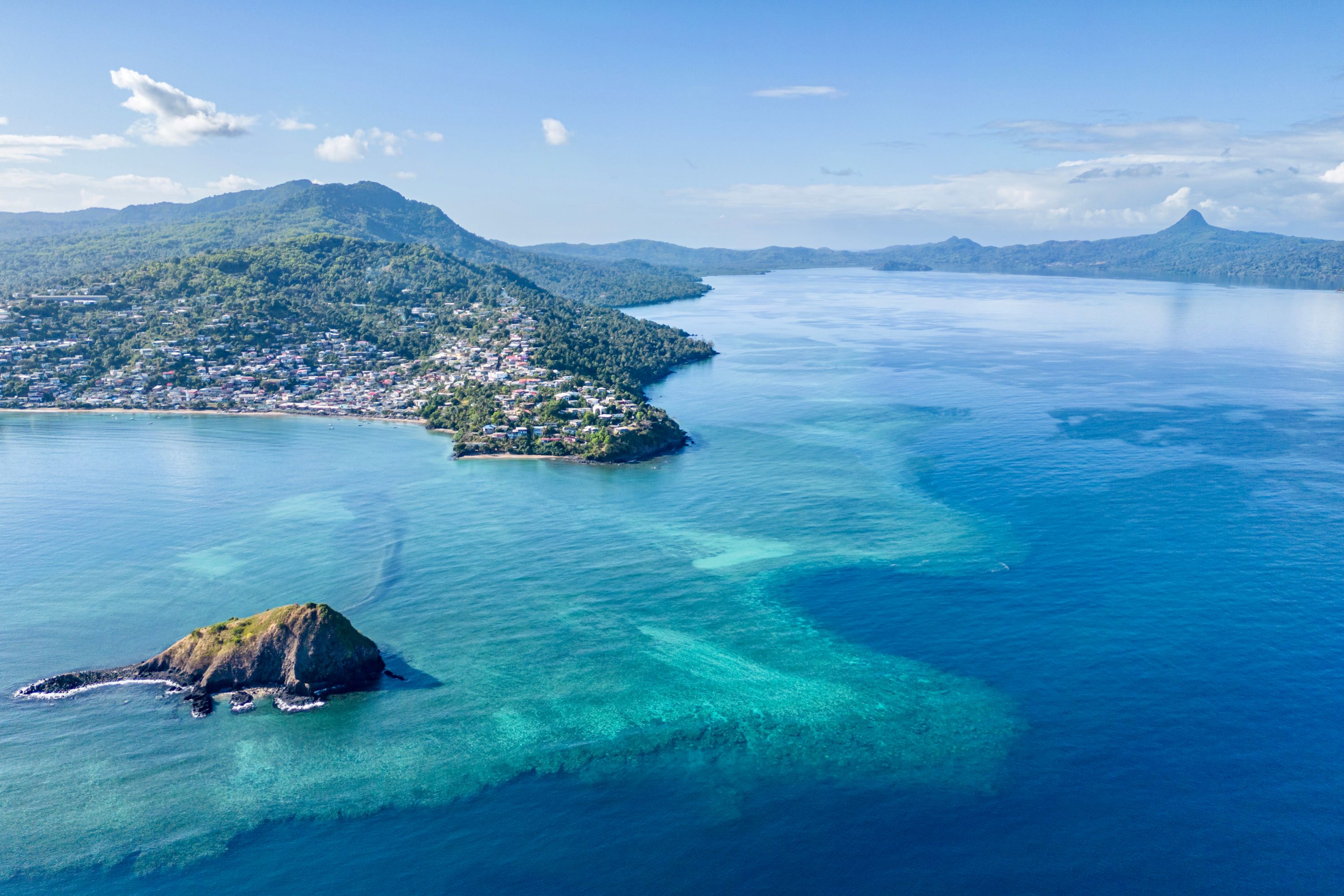 Aerial view of Mayotte's coastline and turquoise waters