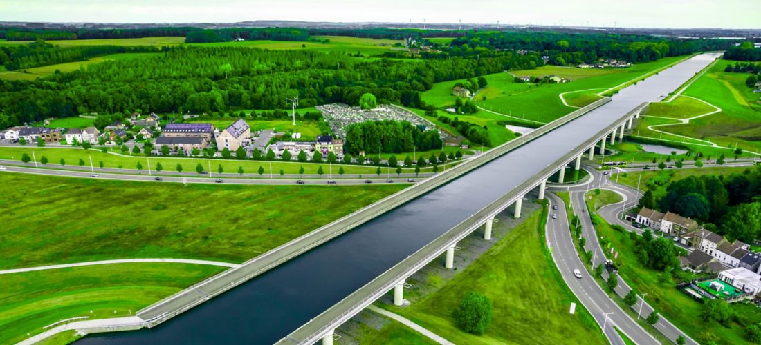 Sart Canal Bridge Over Traffic Circle in Belgium's Green Landscape