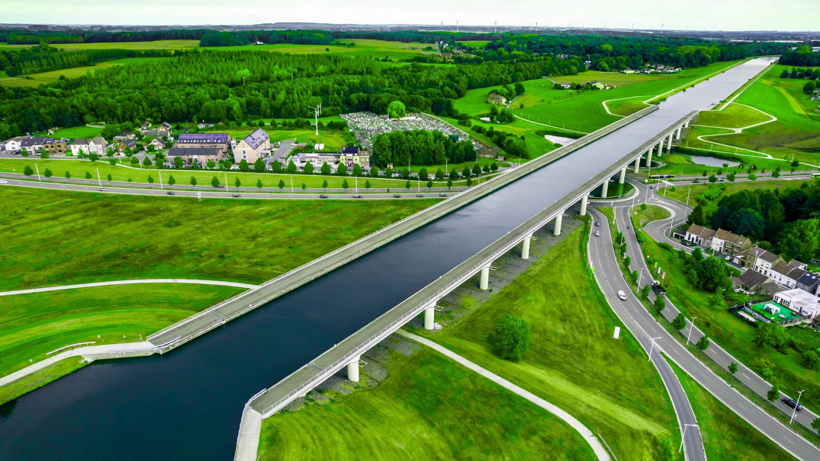 Sart Canal Bridge Over Traffic Circle in Belgium's Green Landscape