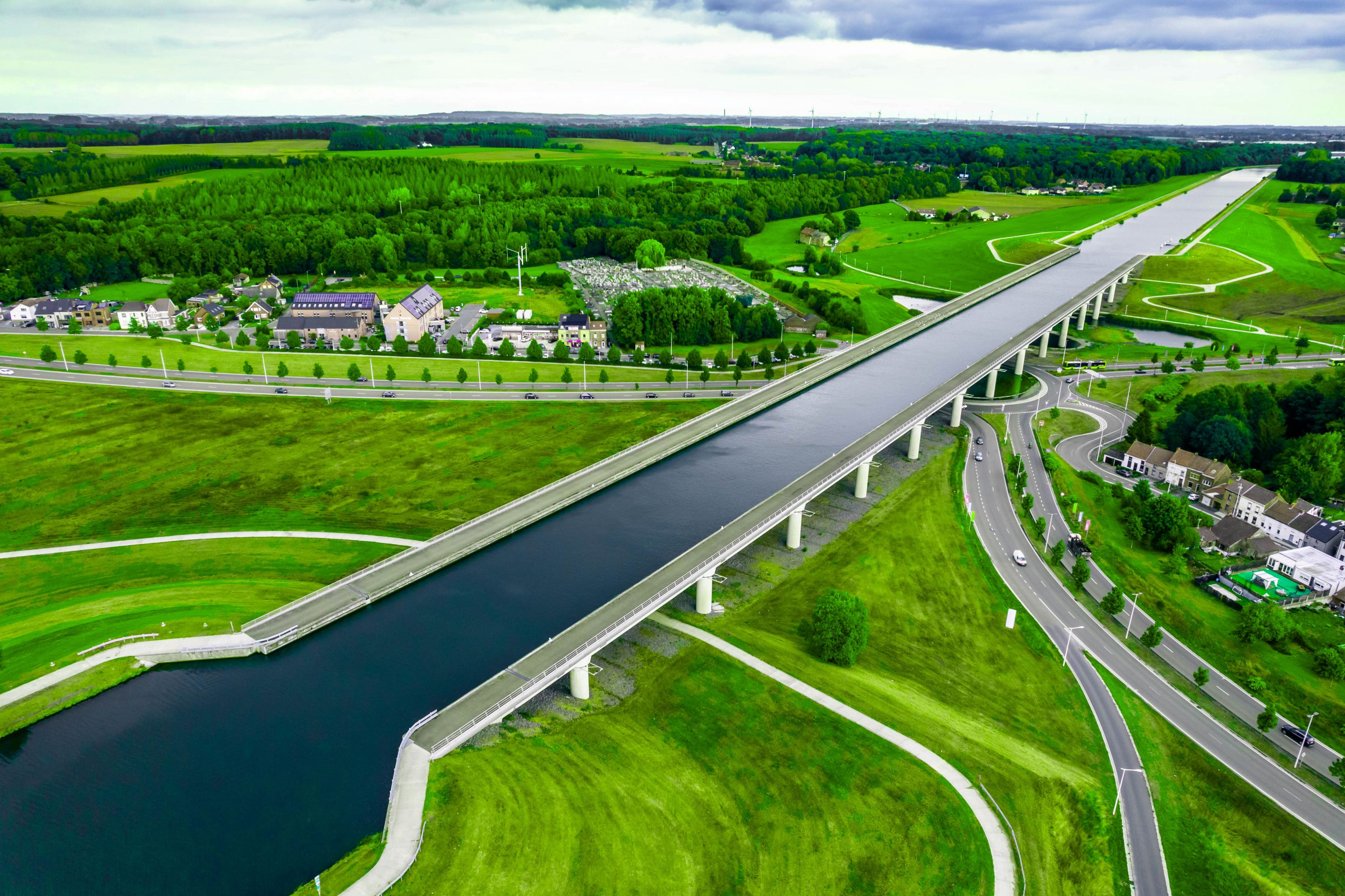 Sart Canal Bridge Over Traffic Circle in Belgium's Green Landscape