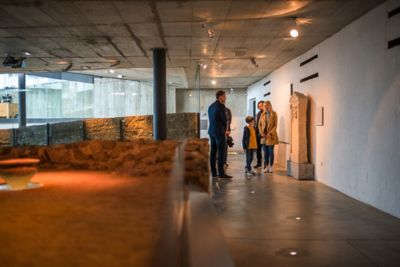 Visitors amid ancient artefacts at the National Museum of Slovenia in Ljubljana