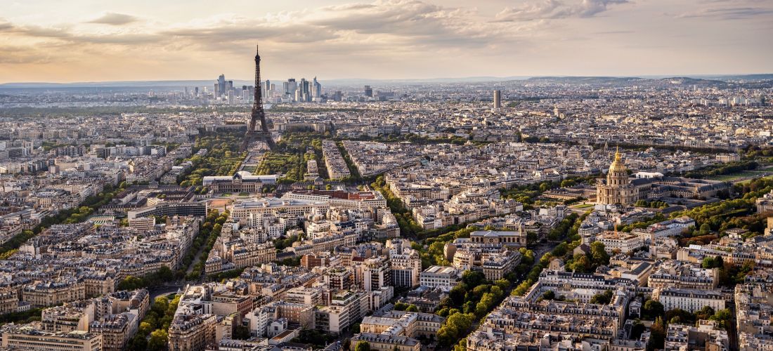 Parisian Sunset Panorama: Eiffel Tower and Cityscape