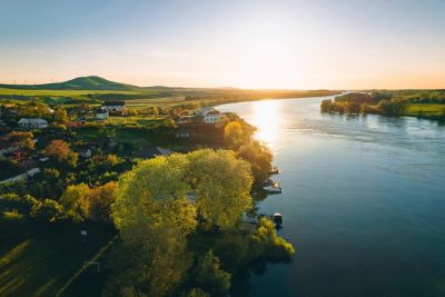 A tranquil village on the banks of the Danube river in Romania