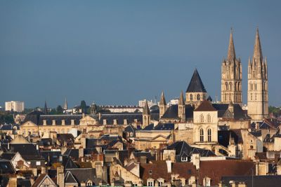 The rooftops and spires of Caen city in France, seen from medieval Caen Castle