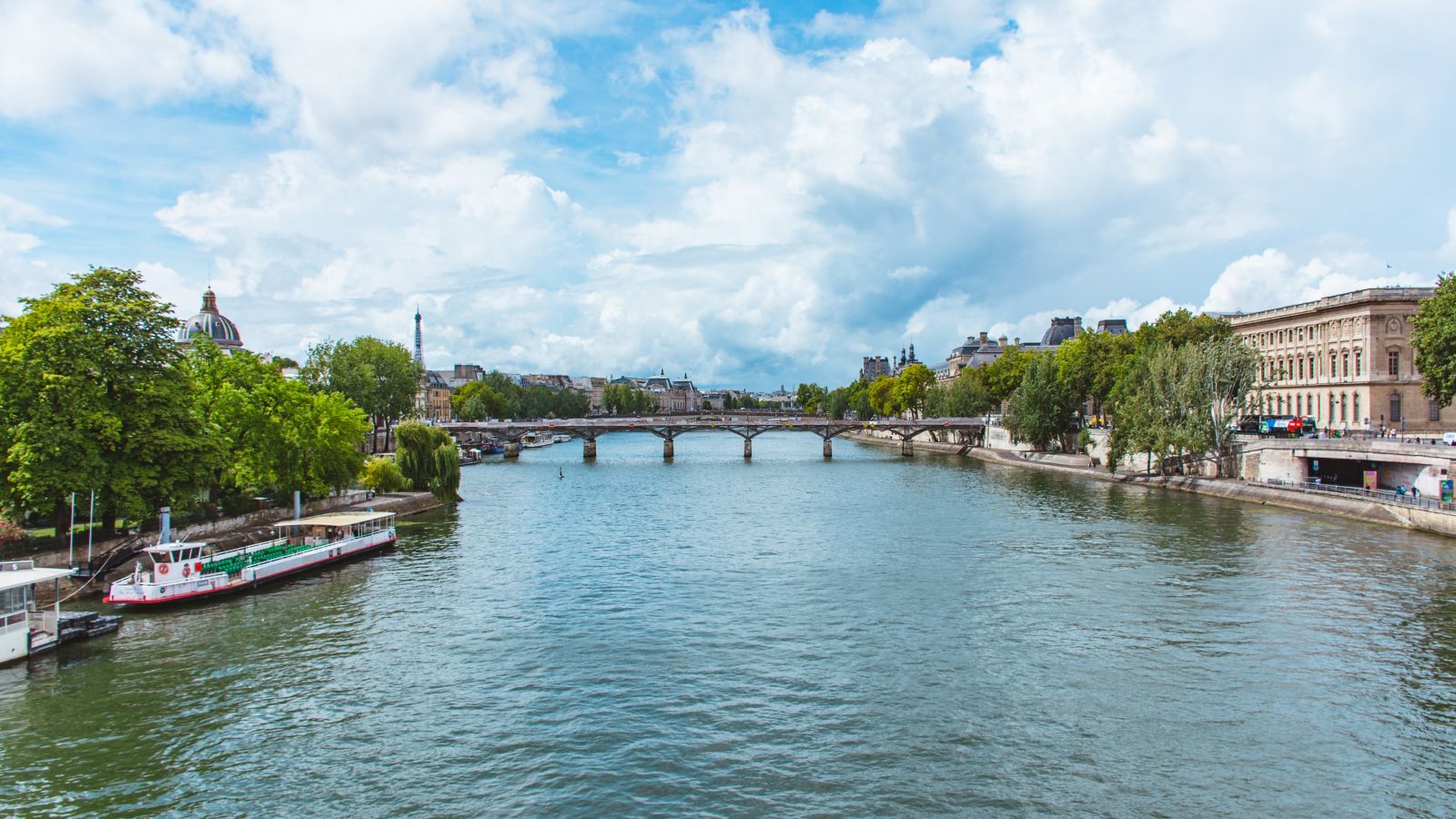Parisian Panorama: Bridge over the Seine with Eiffel Tower in Distance