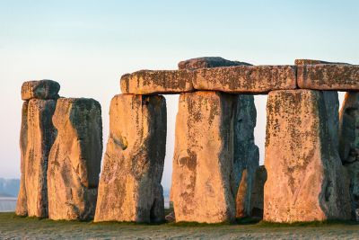 Stonehenge in Wiltshire bathed in a golden morning light