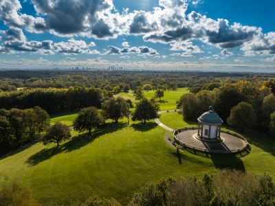 Heaton Park Temple in Manchester surrounded by green fields and lush parkland