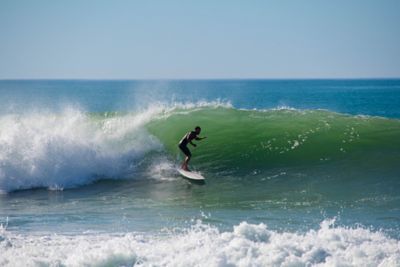A surfer catching a wave on France's Atlantic coast