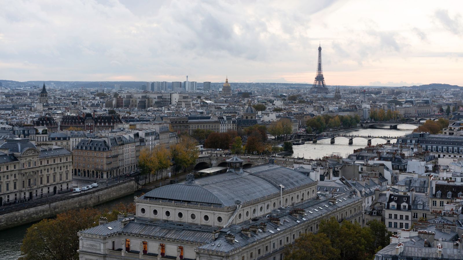 Parisian Panorama: Eiffel Tower and Cityscape at Sunset