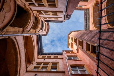 The courtyard of a traboule in Vieux Lyon, with impressive stonework