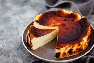 A creamy San Sebastián cheesecake with a golden, slightly scorched exterior