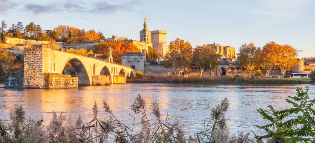Sunset over Avignon: A view of the bridge and Papal city