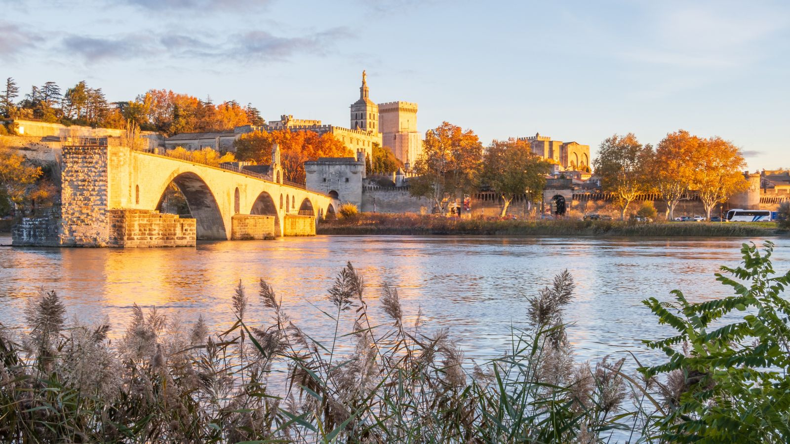 Sunset over Avignon: A view of the bridge and Papal city