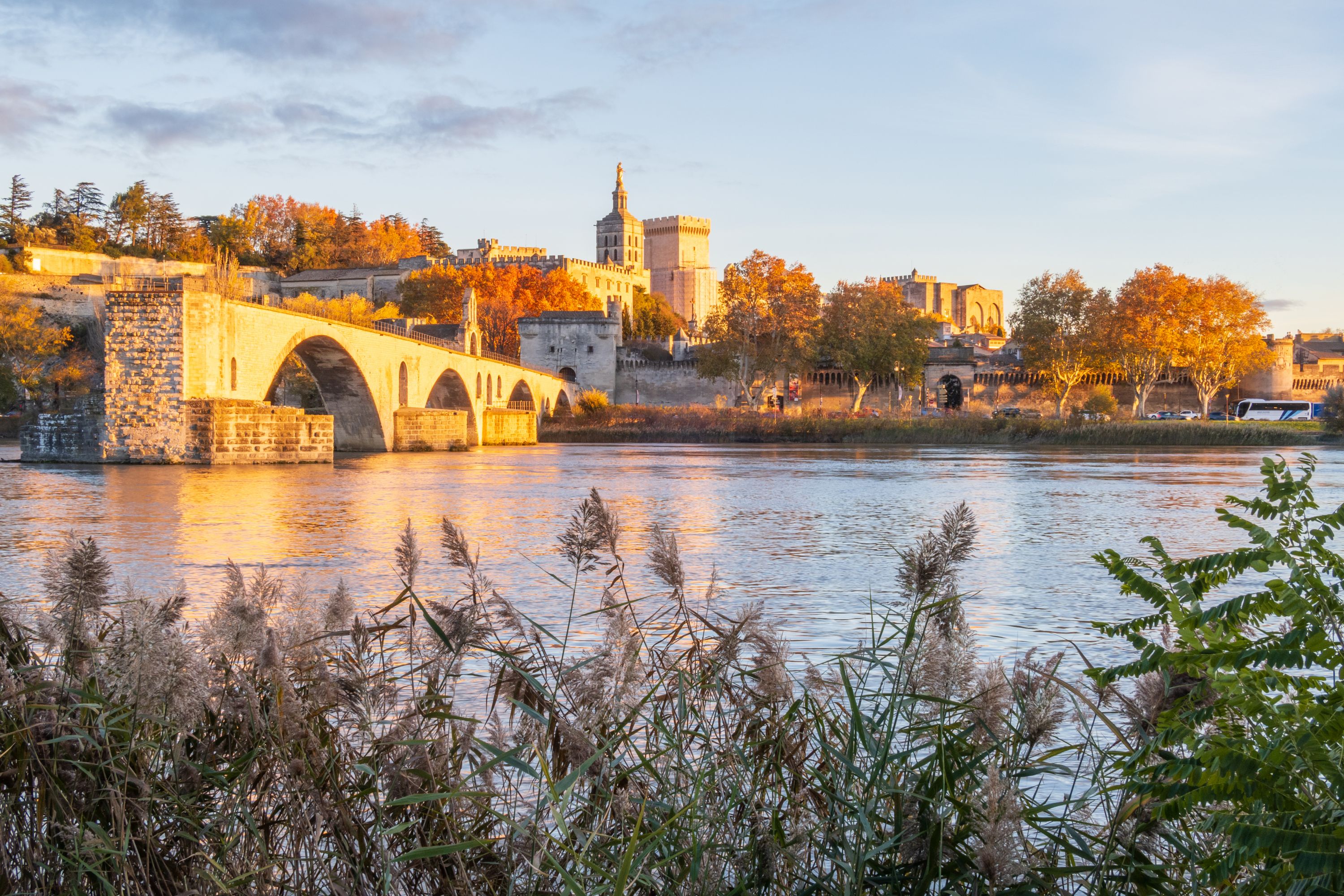 Sunset over Avignon: A view of the bridge and Papal city