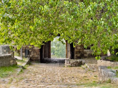 A cobbled path leading to the arched Defterdar Gate at Belgrade Fortress, Serbia