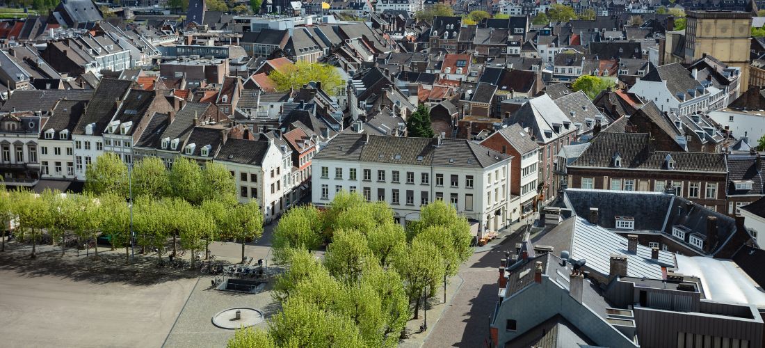 Charming Maastricht: City Panorama of Old Houses and Verdant Squares