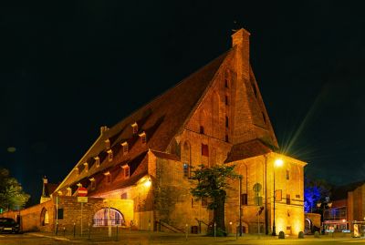 The red-brick Great Mill, housing Gdańsk's Amber Museum, illuminated at night