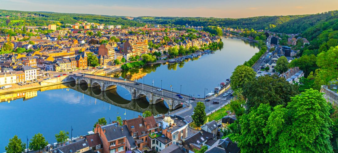 Sunrise over Namur: Cityscape with Meuse River and Pont de Jambes Bridge