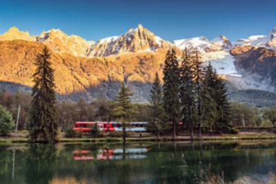 Rugged mountains framing tranquil Lac des Gaillands in the French Alps