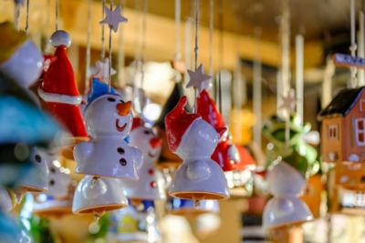 Cute ceramic snowman ornaments at a Christmas market in Riga, Latvia