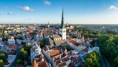 The attractive orange rooftops of Tallinn Old Town, punctuated by slender church spires