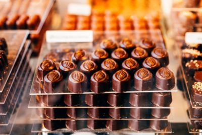 Handmade chocolates on display in a boutique in Bruges, Belgium
