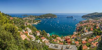 Boats dotting the turquoise bay of Villefranche-sur-Mer near Nice, France