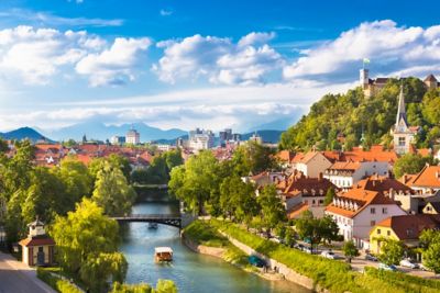 Ljubljana's orange rooftops, modern skyscrapers and tree-lined Ljubljanica River