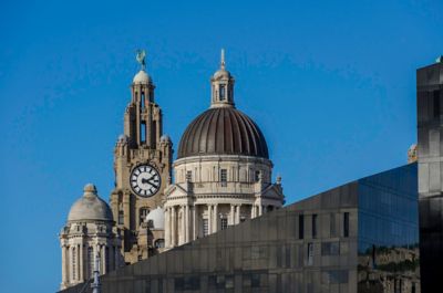 Liverpool's skyline, featuring a clock tower, domes and modern buildings