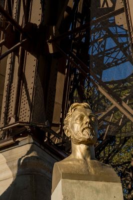 The gilded, bronze sculpture of Gustave Eiffel at the Eiffel Tower, Paris