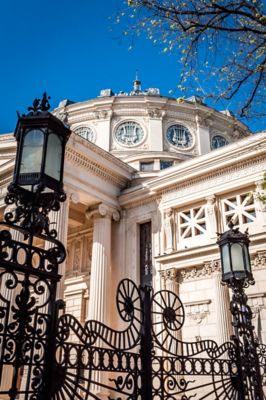 The Neoclassical Romanian Athenaeum, with columns and a dome, in Bucharest Old Town