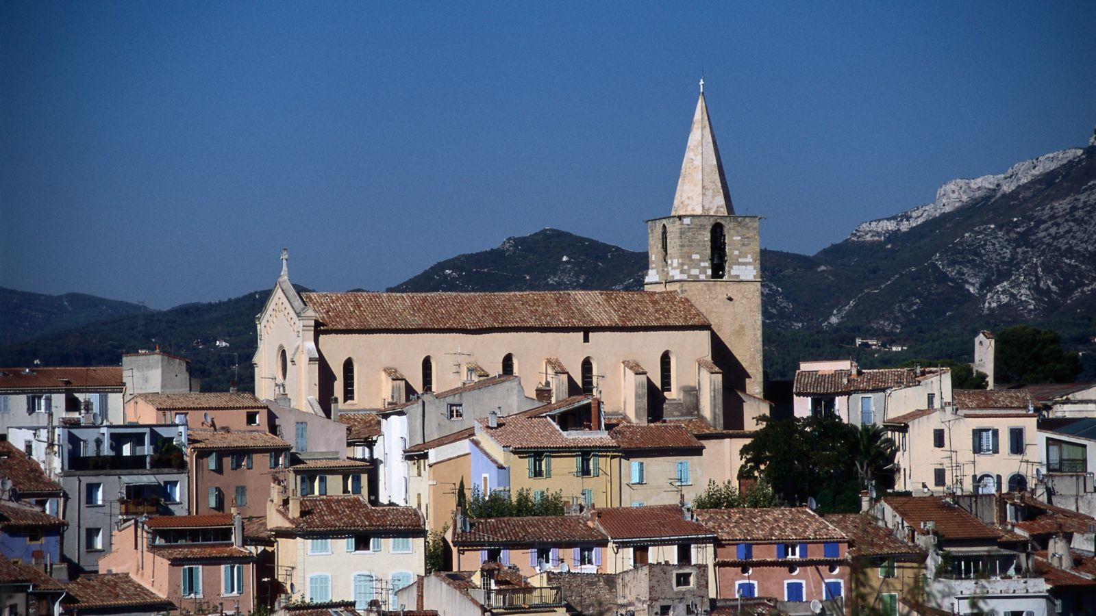 Aubagne Townscape: Church Spire and Colorful Houses