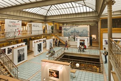 Visitors among large-panelled exhibits at the Comics Art Museum, Brussels